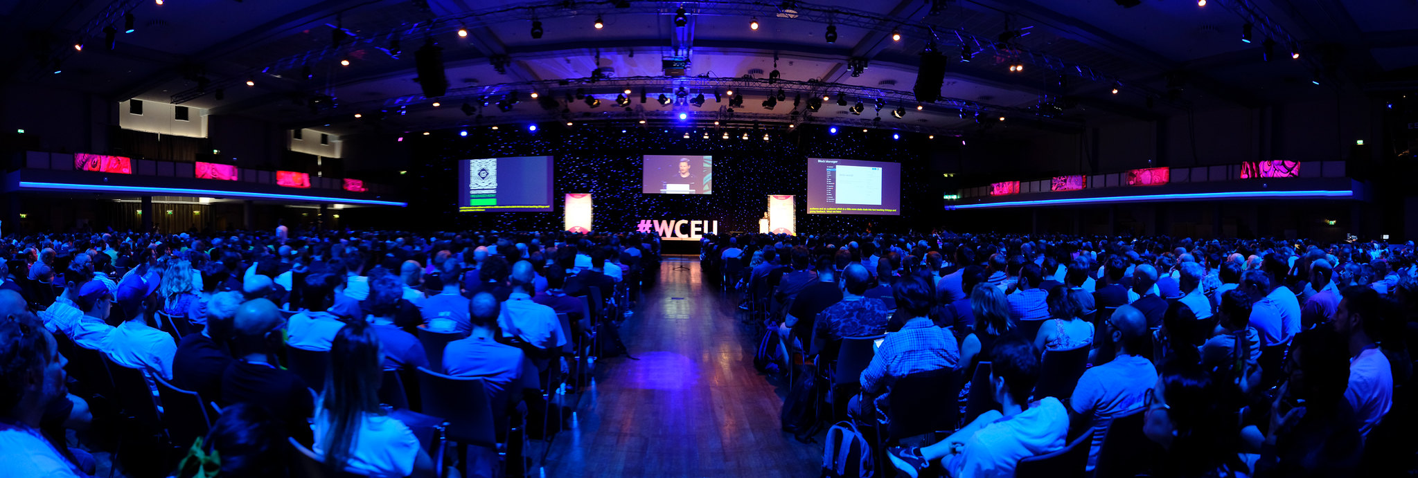 View of WCEU 2019 stage and audience from the back of the hall
