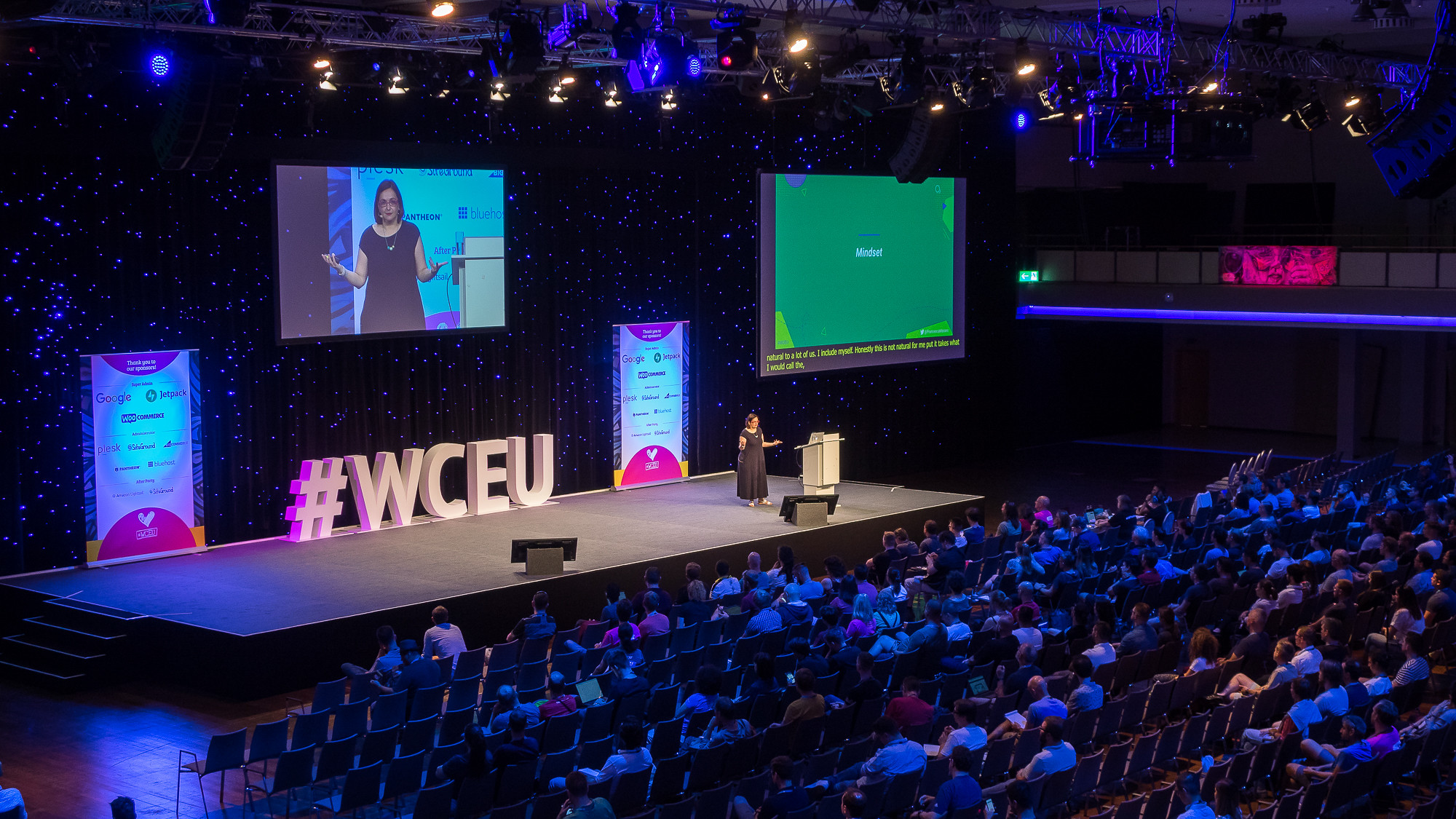 Presenter on stage in the main auditorium of WCEU 2019.