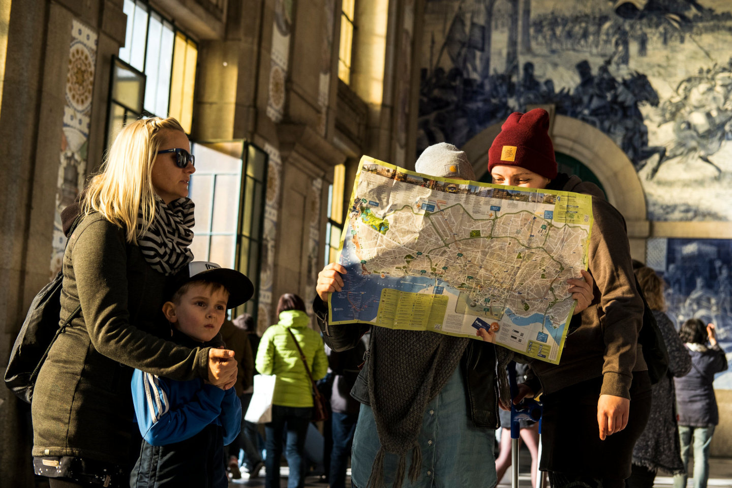 Tourists looking at Porto map