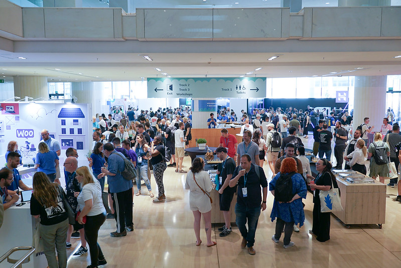 People smiling and laughing at WordCamp Europe 2023